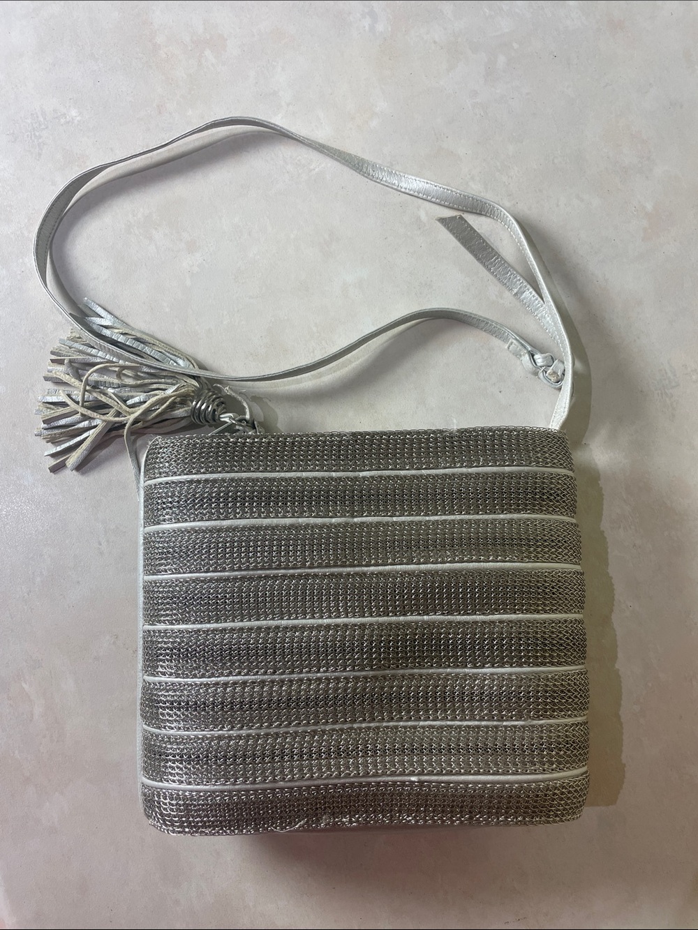 Sharif Silver Metallic Crossbody Bag with Tassel